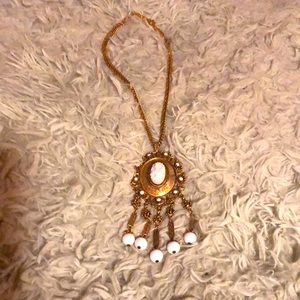 Vintage, gold tone, double chained flowers cameo necklace.